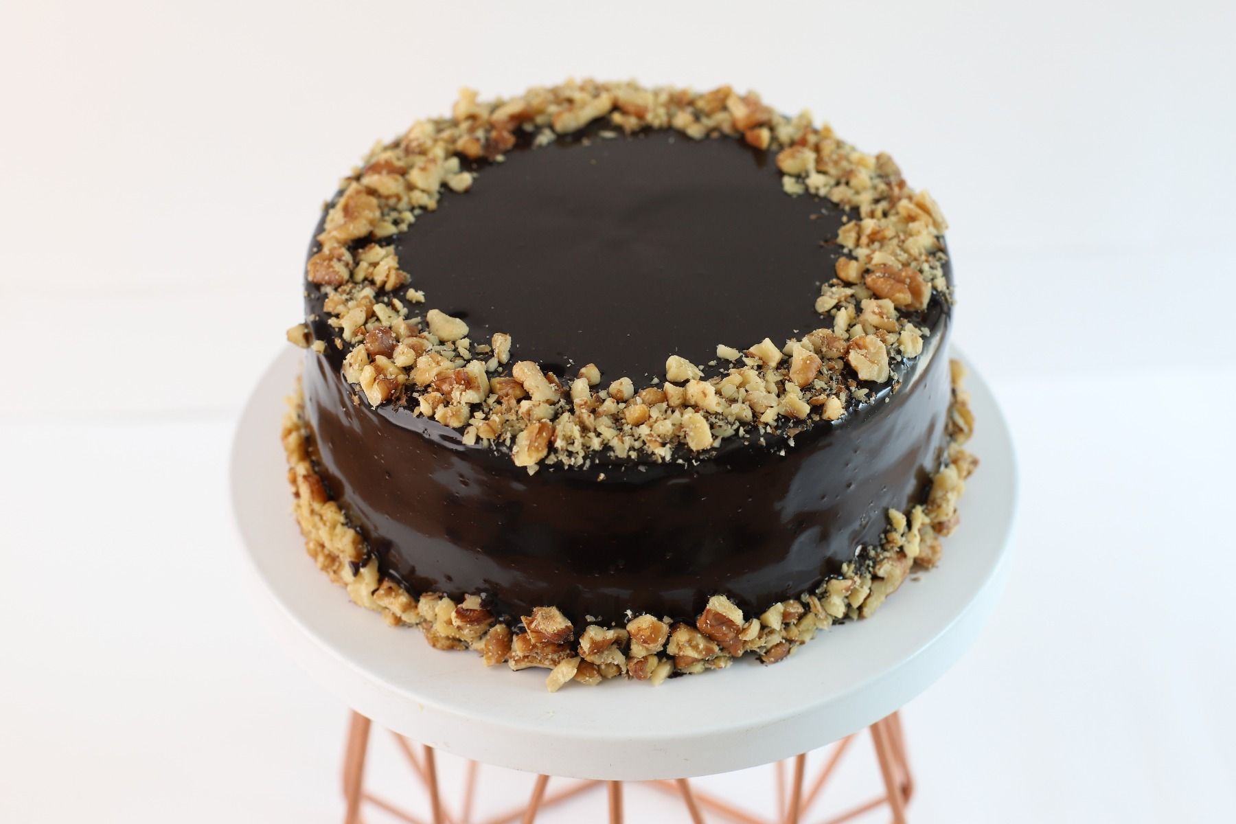 Ferrero Rocher Cake with Meringue Layers and Nutella Frosting